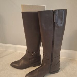 High flat boots with pointed toe.  Side zipper and buckle